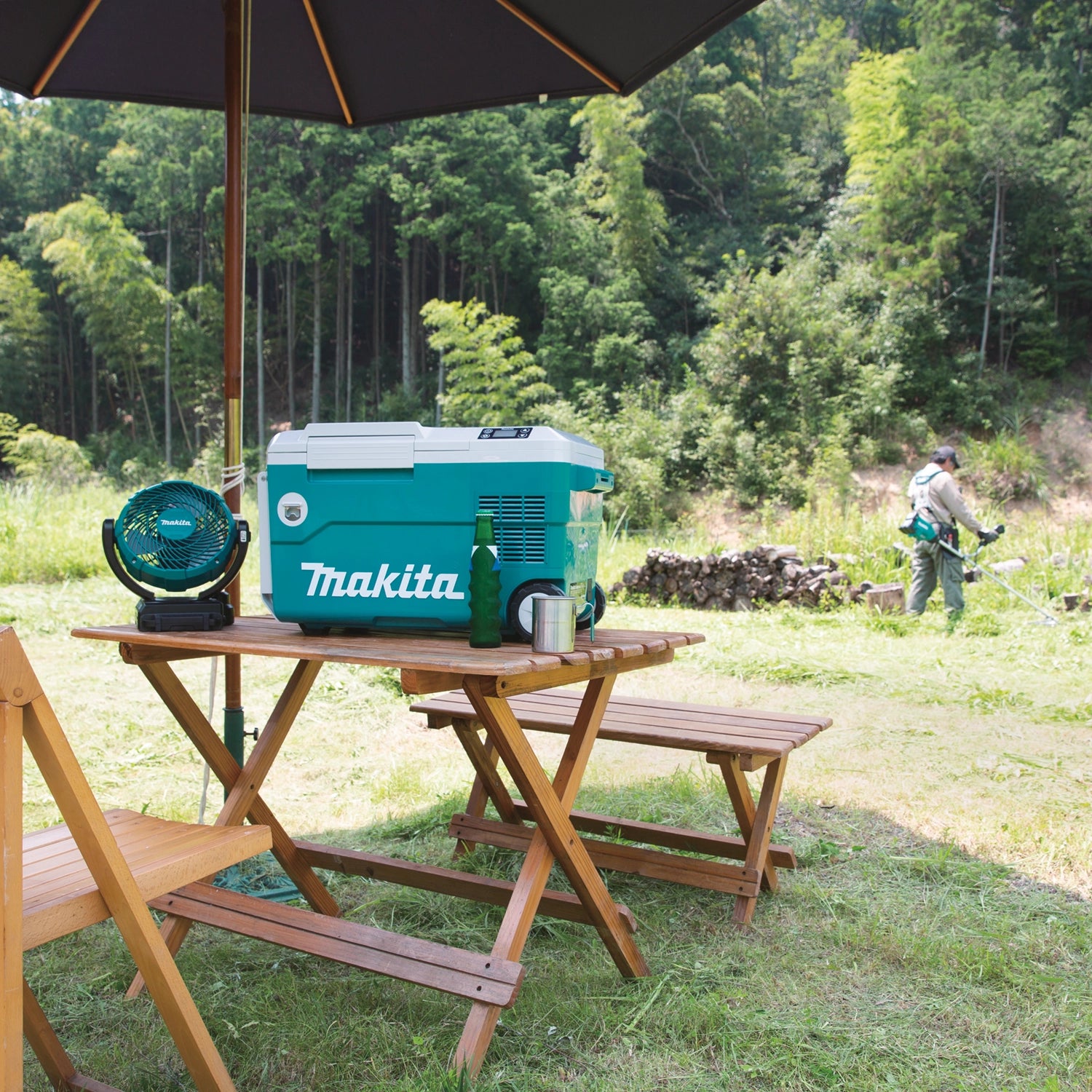 makita cooler warmer box on table during lunch break at work site
