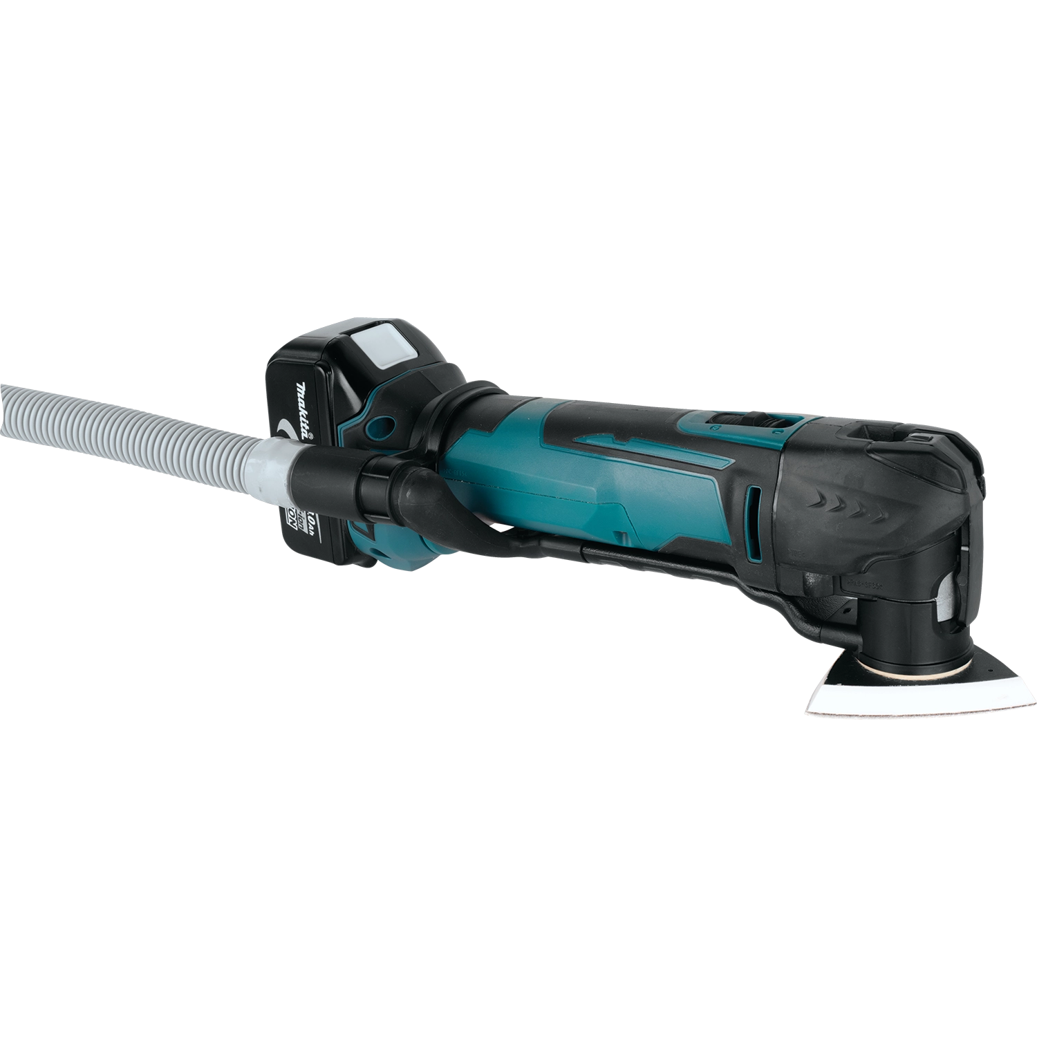 makita dust extraction kit installed on multi-tool with blade attached for cutting
