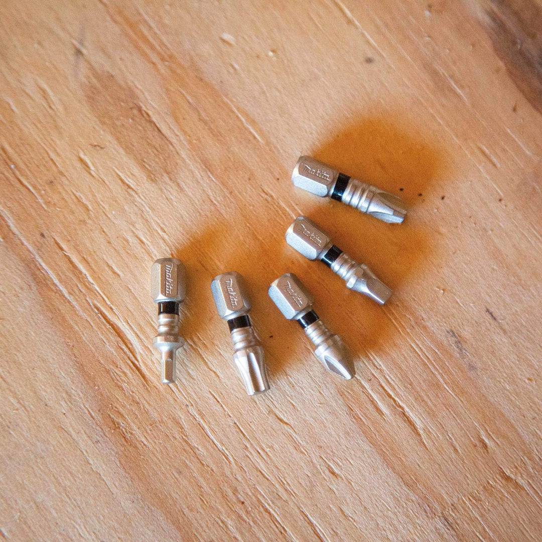 makita bits pinned into material on jobsite ready for fastening
