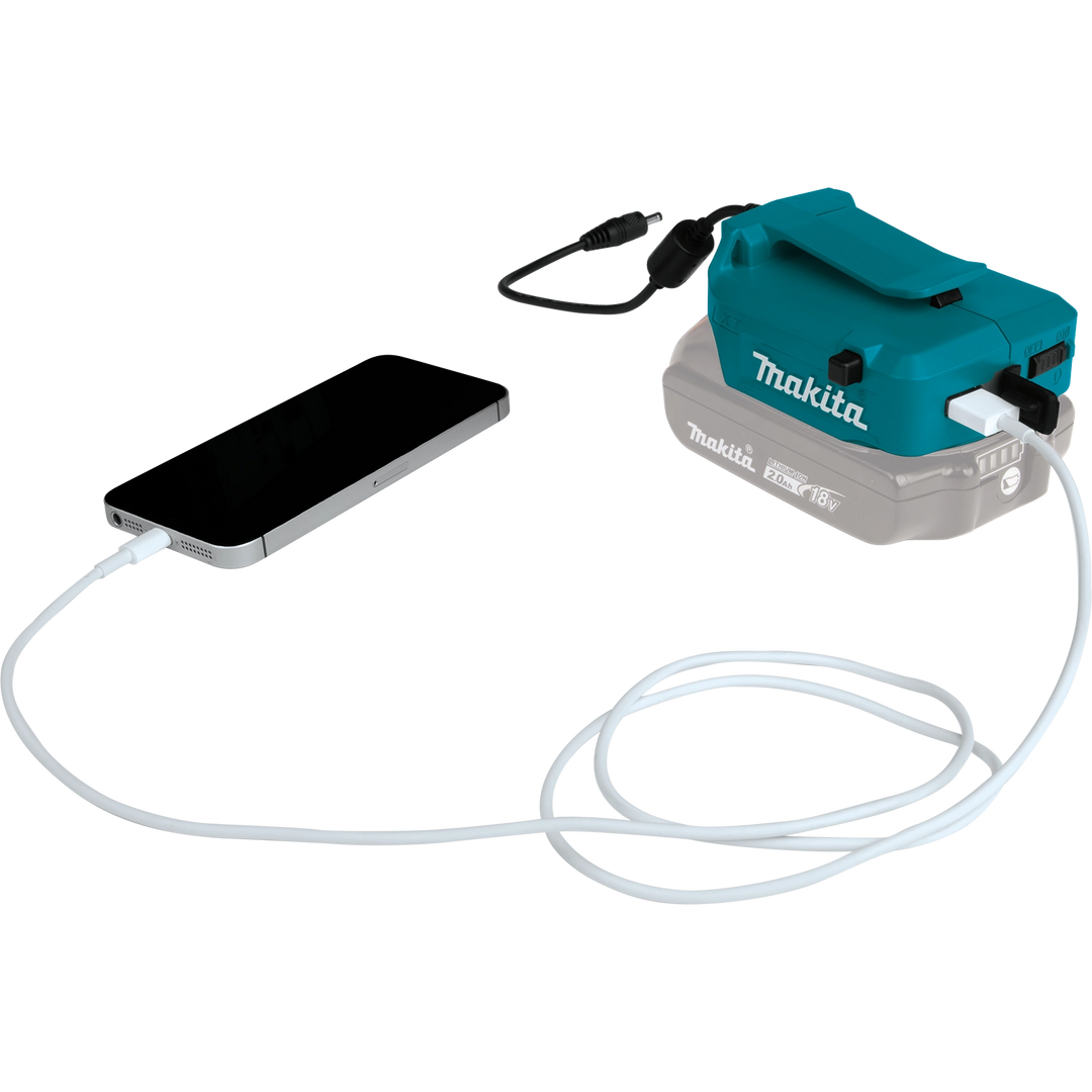 makita 18v lxt power source plugged into smartphone for mobile device charging
