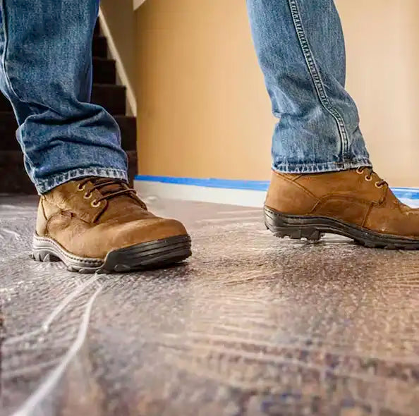 Presto 36" carpet protection applied flat on a synthetic carpeted floor for surface coverage
