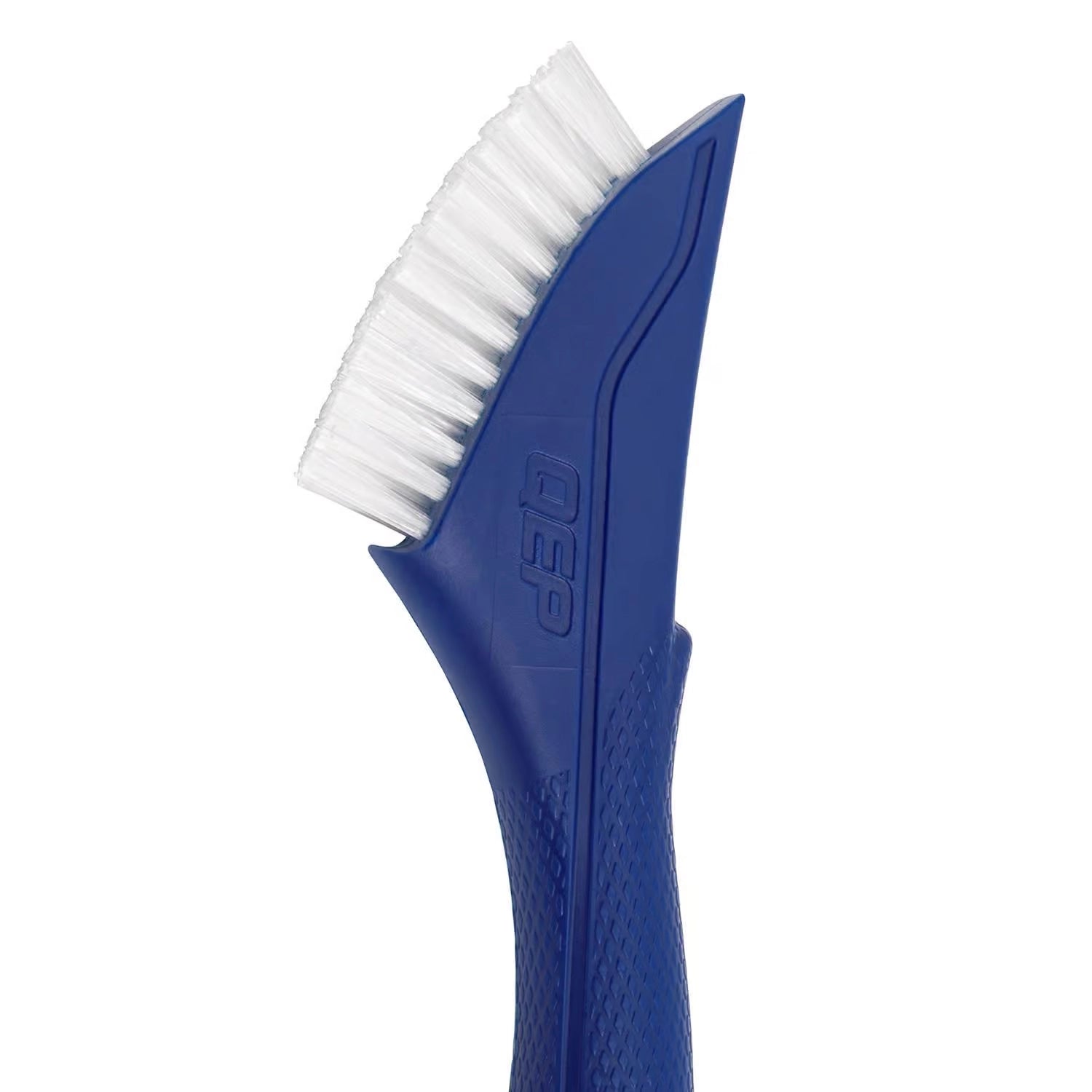 Close-up of QEP brush head showing bristle texture and scraper edge
