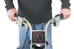 Hands operating the dual-handle controls of the Rotovac 360i