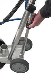 Hand adjusting the telescoping handle on the Rotovac 360i carpet extractor