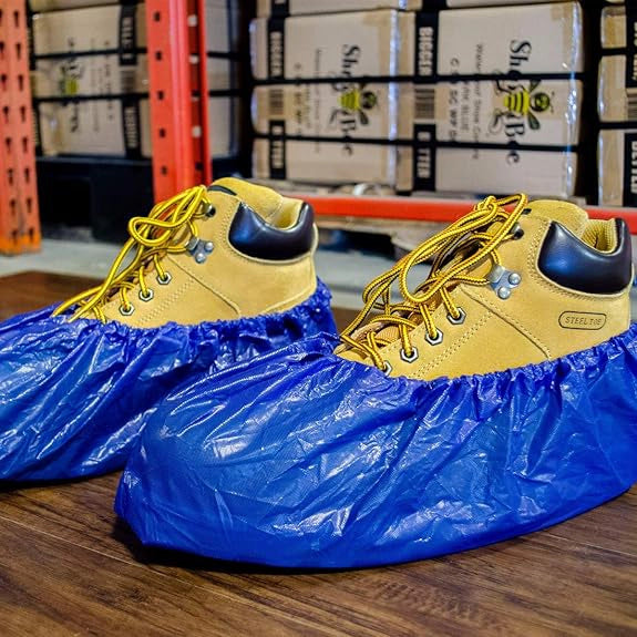 Shubee dark blue waterproof covers placed over contractor shoes
