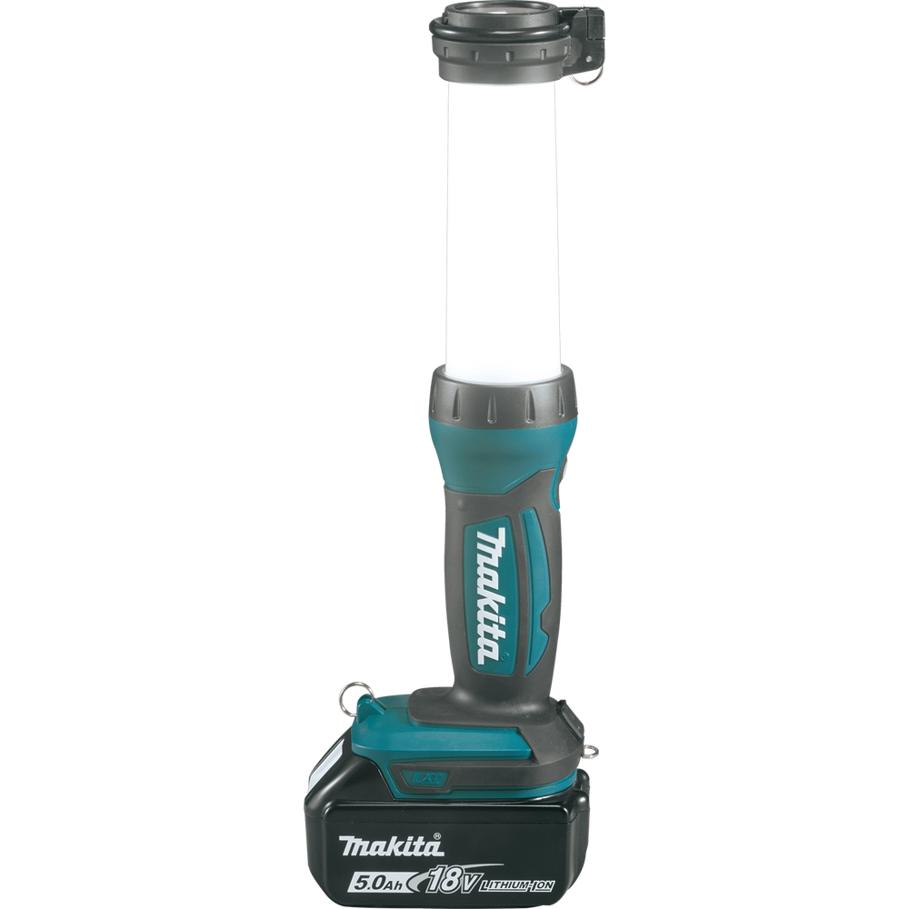 side view of makita lantern flashlight with 18v lxt battery installed
