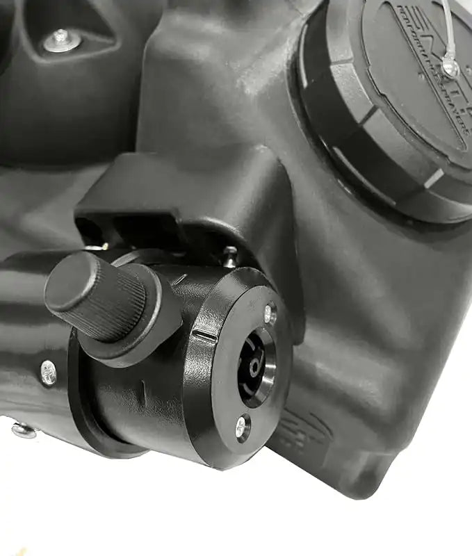 Close-up of the red power switch and adjustable control knob on top of fogger
