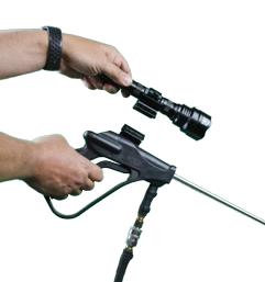 Professional using SOS Injection Sprayer during restoration or cleaning work
