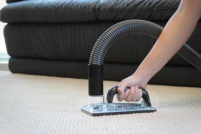 SOS sub surface extraction hand tool in use during carpet cleaning restoration task
