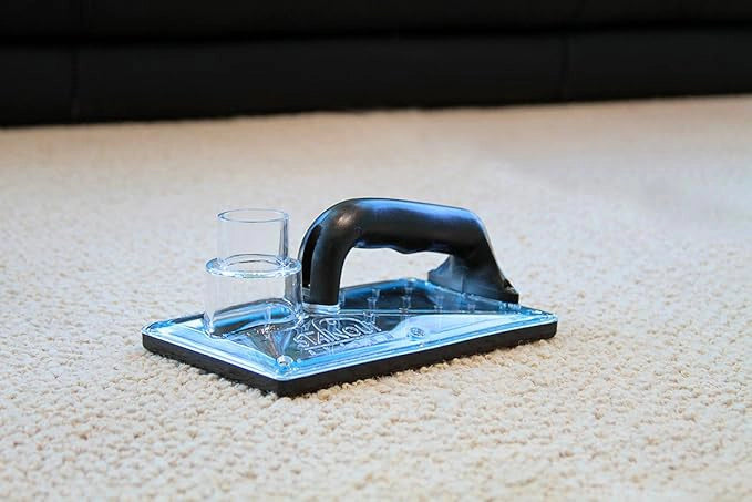 SOS sub surface extraction tool placed on carpet surface prior to use
