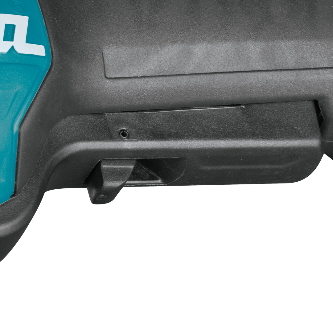 switch detail and label on makita grinder with makita branding visible
