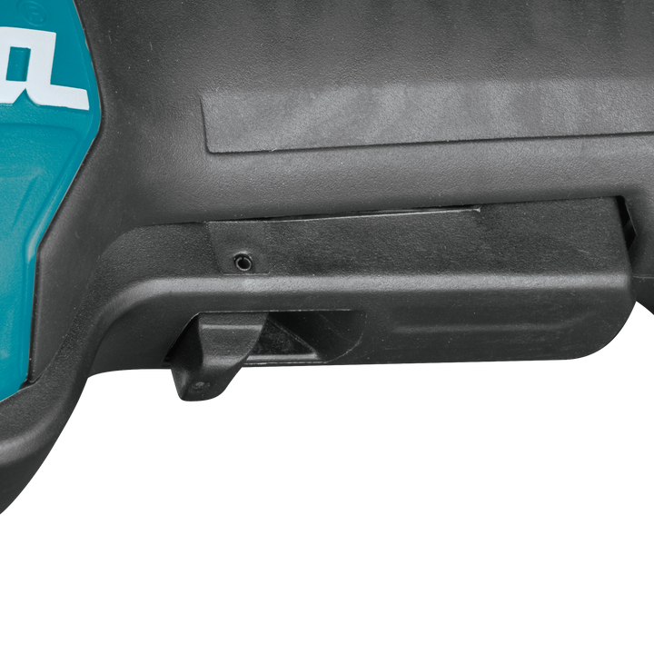switch detail and label on makita grinder with makita branding visible
