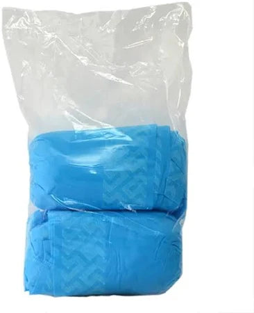 Tall package of Trimaco blue shoe guards shown sealed and ready for use
