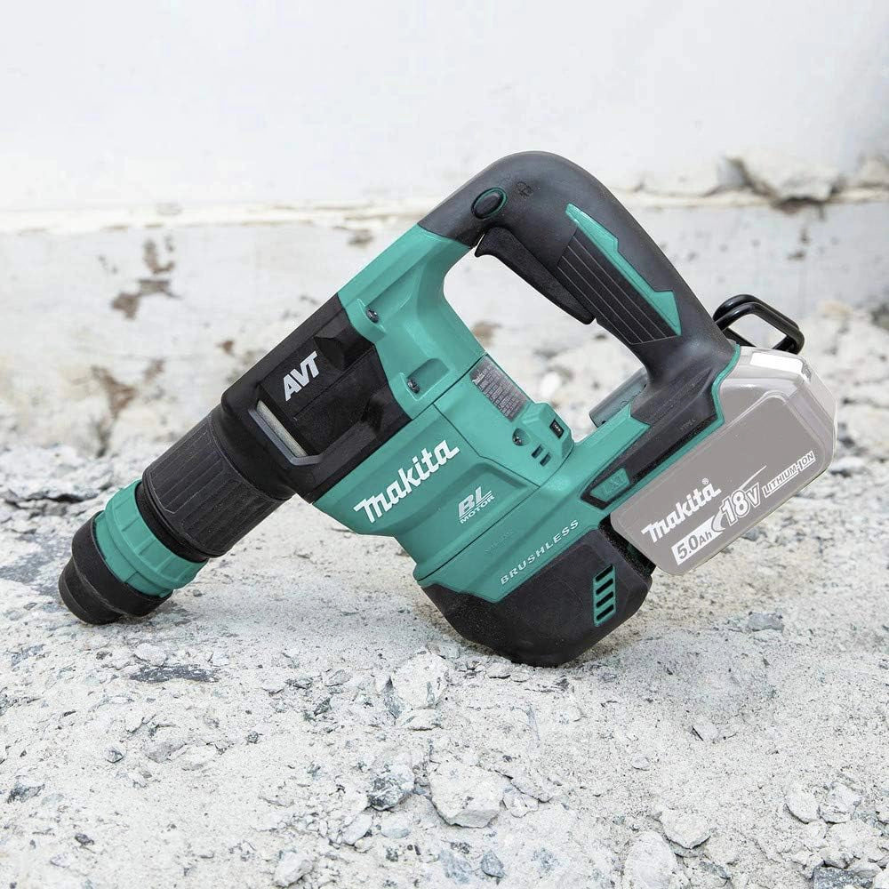 makita 18v lxt cordless avt power scraper positioned on job site floor during tile removal
