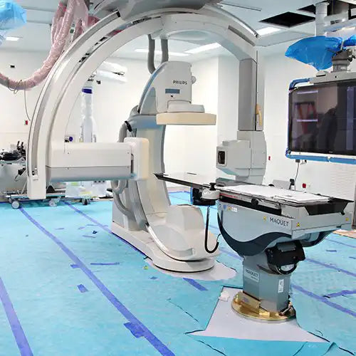 Trimaco AquaShield protecting floors in high-tech medical imaging room during facility setup

