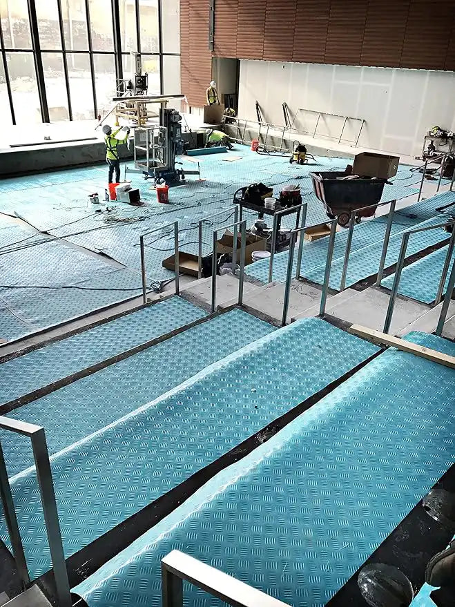 Trimaco AquaShield protecting multi-level flooring during active construction project
