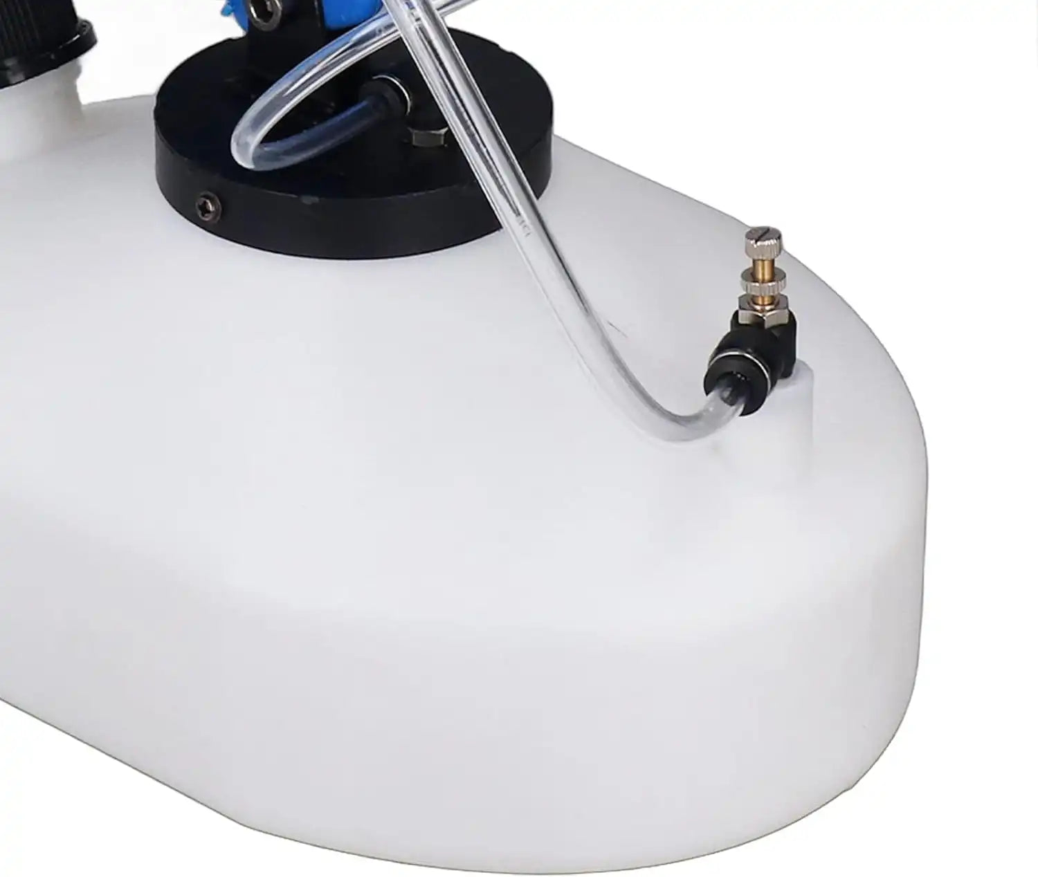 Close-up of fogger’s tubing connection to white tank
