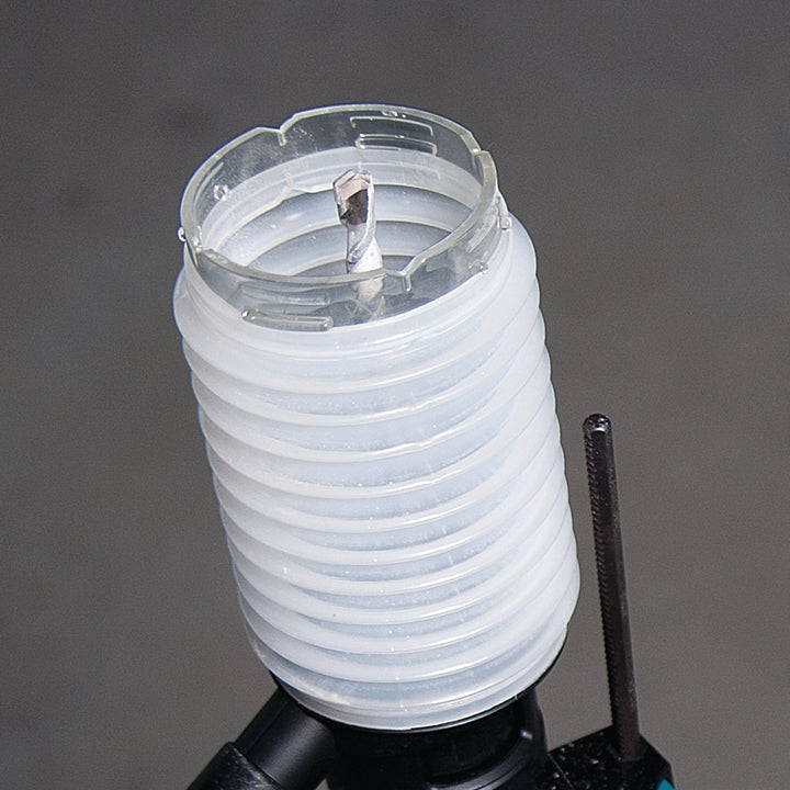 close up of makita dust extraction cup showing flexible clear boot and inner seal
