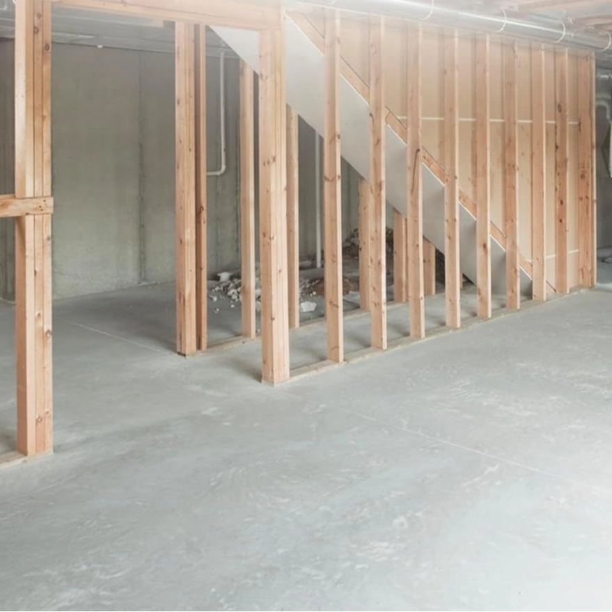 Velo Pro air mover in unfinished basement with caption “high velocity air movement”
