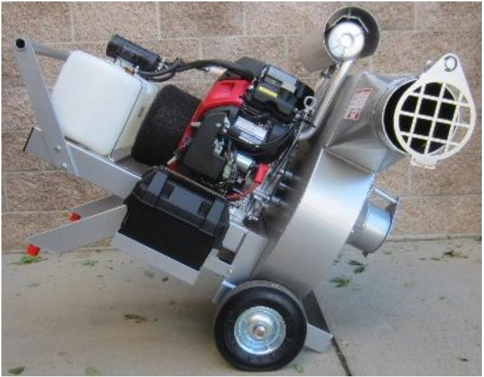 Side view of Vortec vacuum in use on job site during insulation extraction
