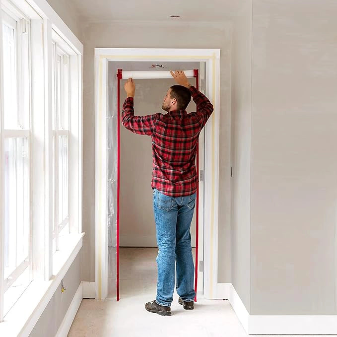 ZipDoor panel sealed on interior doorway in home during renovation
