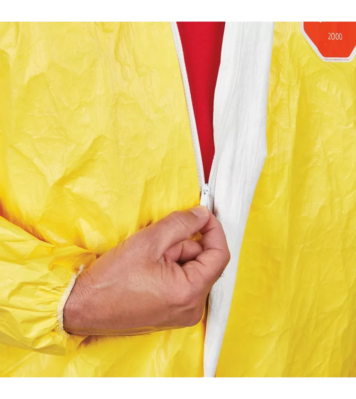 Zipper closure detail on flame-retardant coverall for easy entry and secure seal
