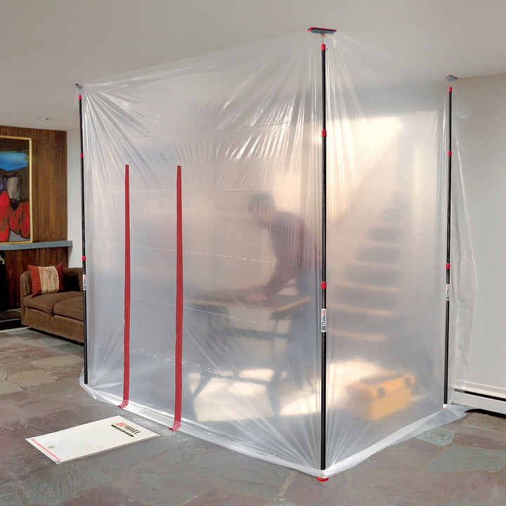ZipWall containment pole system installed inside house for restoration work
