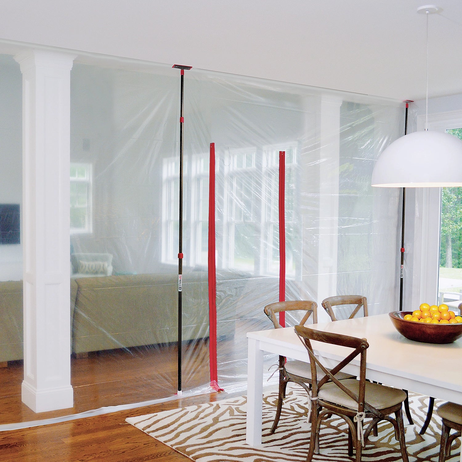 ZipWall 10' poles used in dining room during interior remodeling
