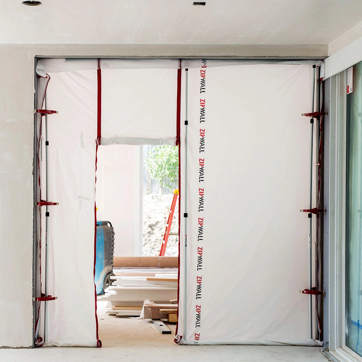 ZipWall SideClamp in use in residential house for containment sealing
