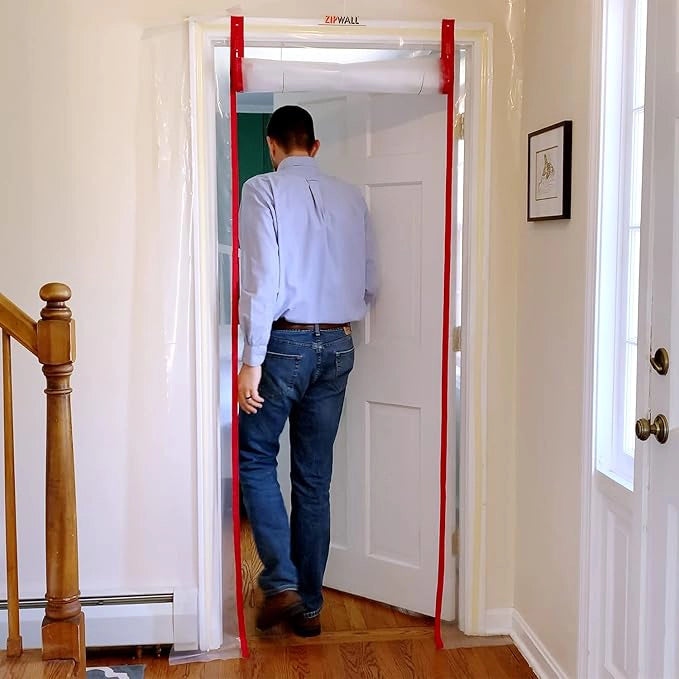 ZipWall ZipDoor installed on residential door inside house for dust barrier

