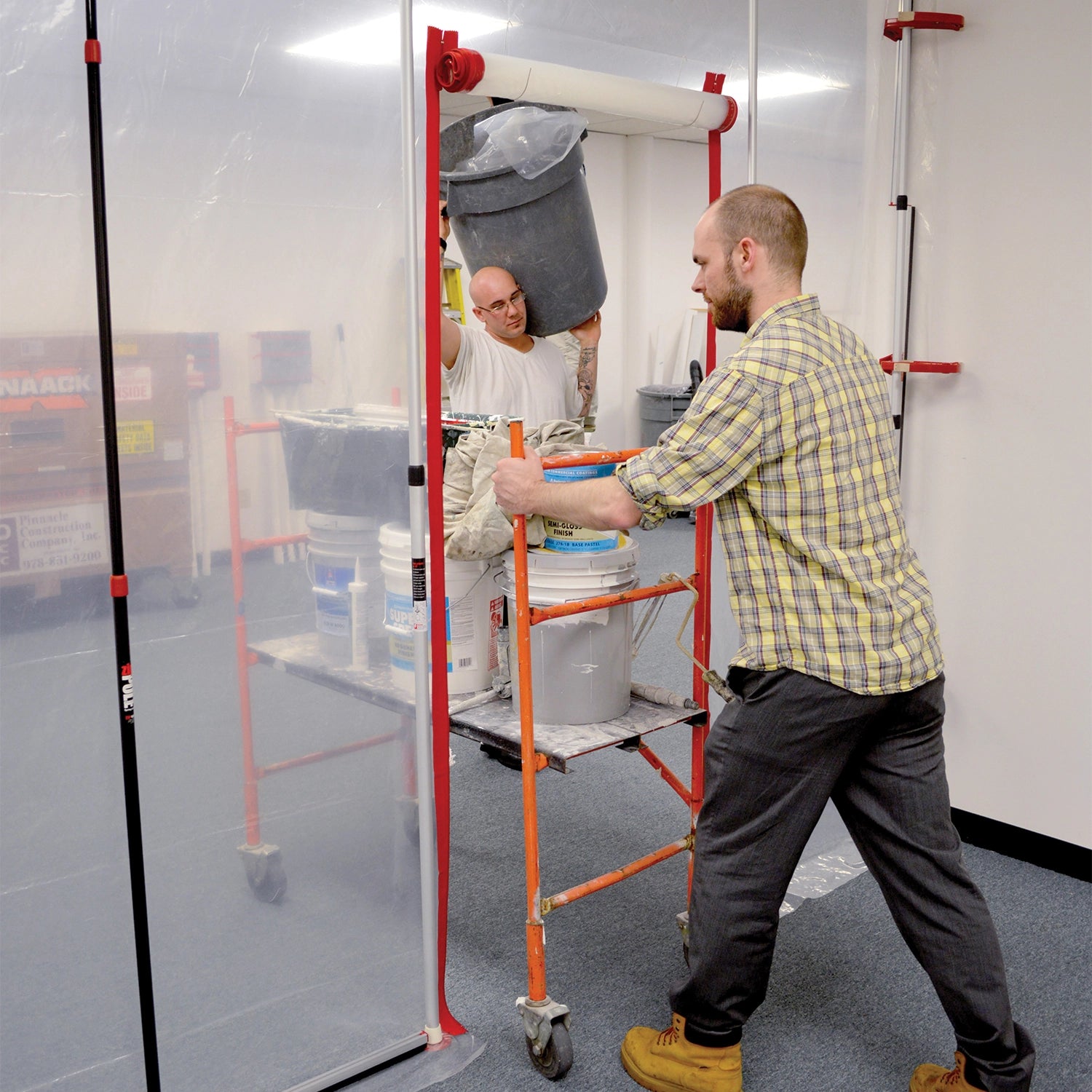 ZipWall dust barrier zipper door in office environment for partitioning work zones

